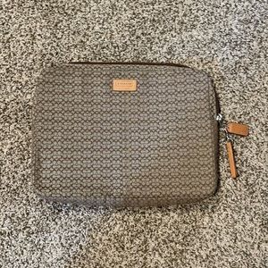 Unisex Coach laptop sleeve.